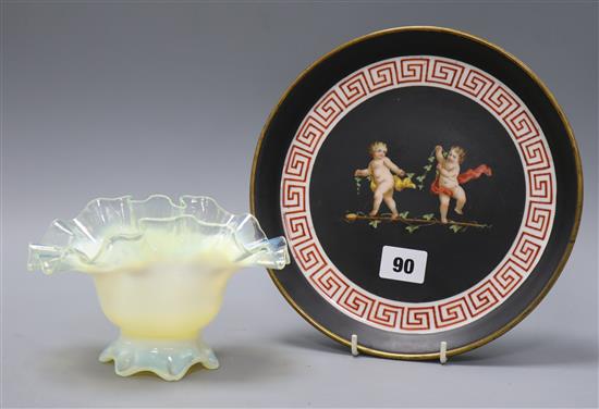 A Vaseline glass vase and a ceramic dish decorated with cherubs dish diameter 23cm